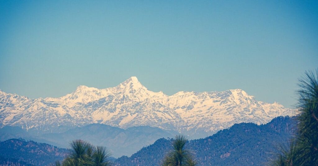 View of a Mountain with Snow Under the Blue Sky
